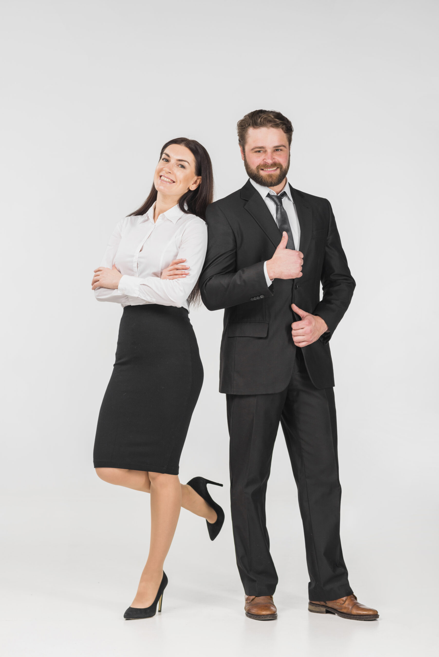 colleagues-man-and-woman-leaning-on-each-other-and-smiling